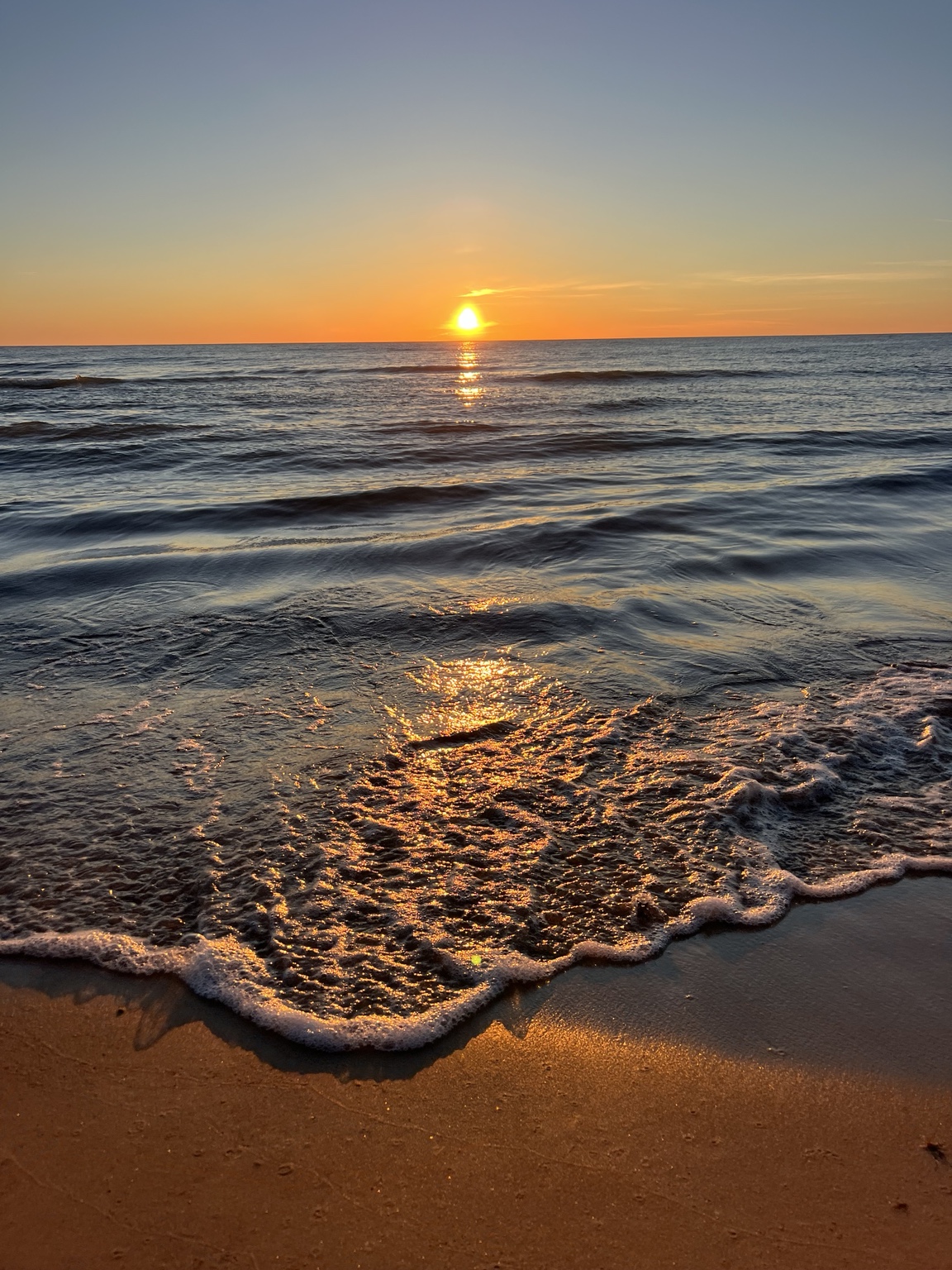 Waves reflecting the evening light on the Baltic Sea